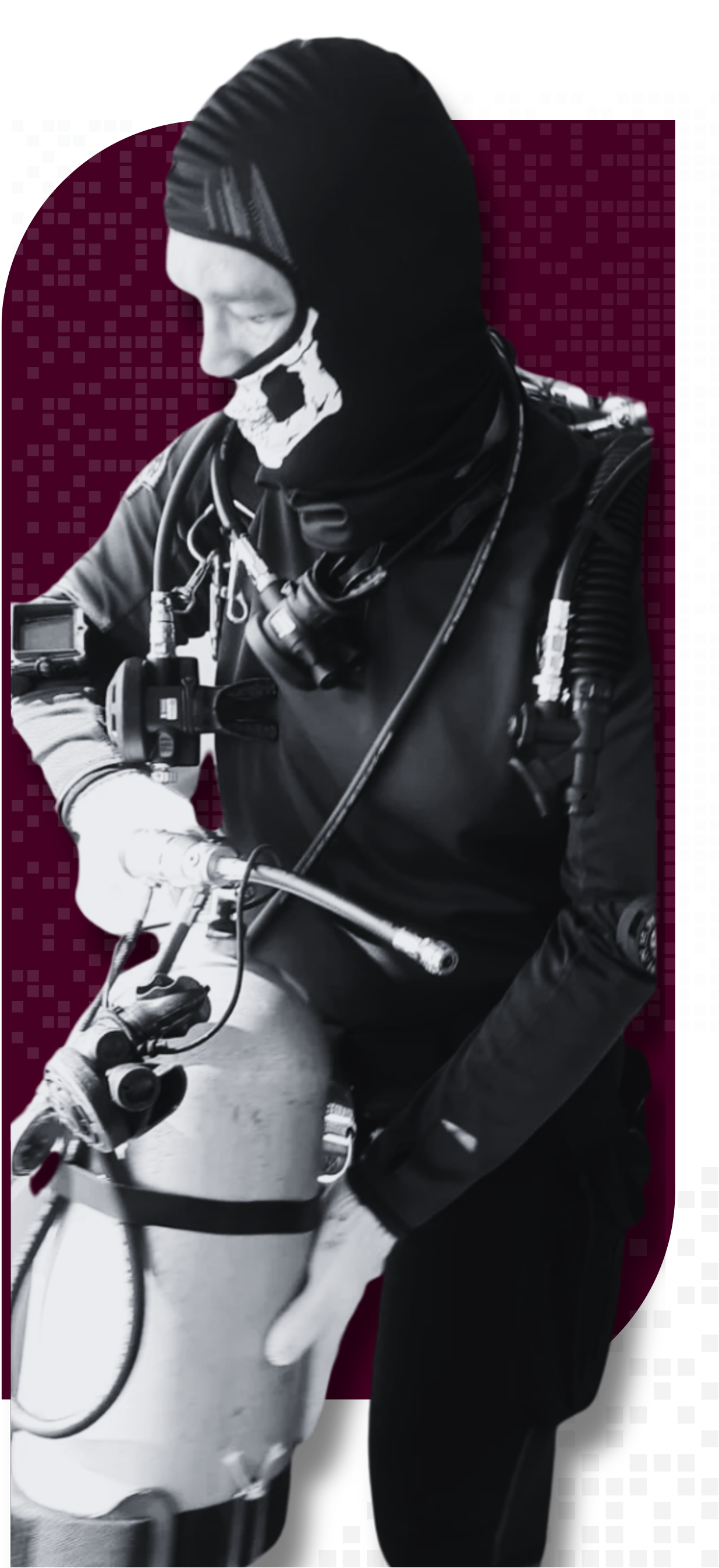 Technical diver in full rebreather setup checking equipment